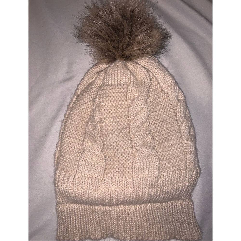 tan faux fur cable knit hat lined with sherpa